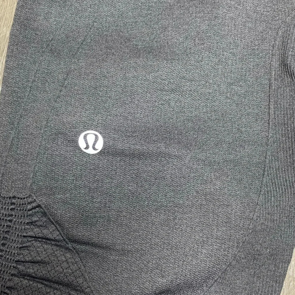 Lululemon Ebb and Flow Crop II in Deep Coal - Picture 11 of 12